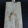 Planche à découper réalisée dans un bois très ancien.